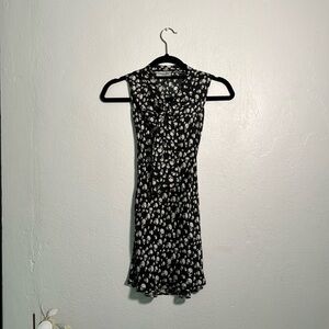 Biased cut dress in black with skull all over print